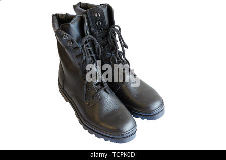 Military style black boots isolated on white background Stock Photo - Alamy