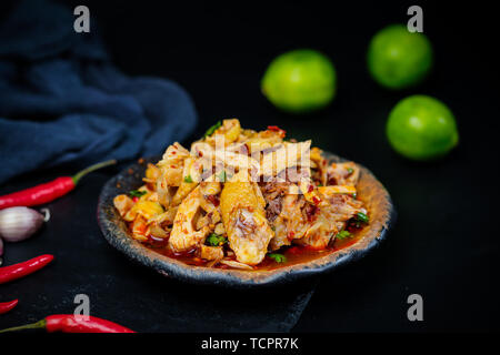 drooling chicken, stick chicken. Stock Photo