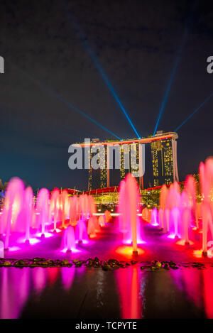 SINGAPORE CITY, SINGAPORE - MARCH 2, 2019: Spectra Light and Water Show Marina Bay Sand Casino Hotel Downtown Singapore Stock Photo