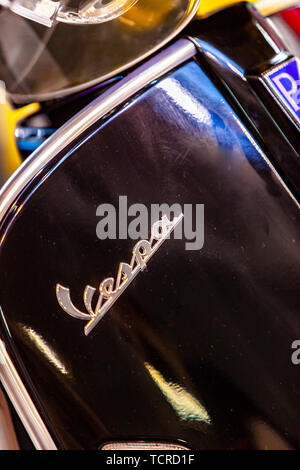 BELGRADE, SERBIA - MARCH 23, 2019: Detail of the Vespa scooter in Belgrade, Serbia. Vespa Vespa is an Italian brand of scooter manufactured by Piaggio Stock Photo