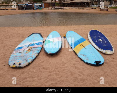 Egypt, Sharm El Sheikh - May 07,2019. surfboards lie on the sand on the beach by the sea. space for text Stock Photo