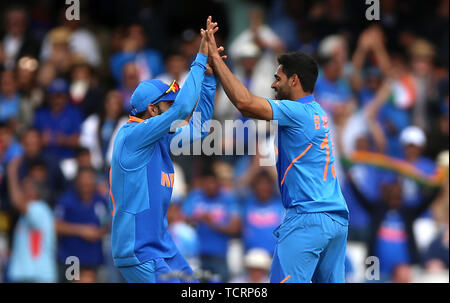 India's Bhuvneshwar Kumar (right) celebrates taking the wicket of Australia's Marcus Stoinis during the ICC Cricket World Cup group stage match at The Oval, London. Stock Photo