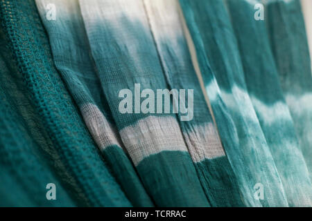 Batik braid glowing dots abstract background Stock Photo