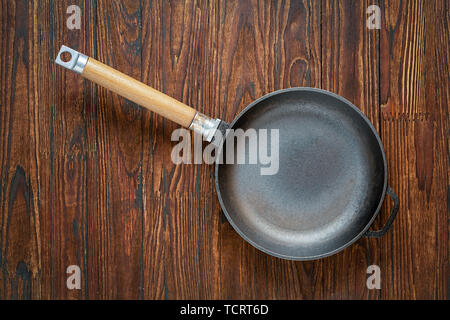 pan, pan on table, cooking, kitchen, stainless steel, baking, pan, round Teflon, cooking, cast iron, pan on table, table top, empty frying Stock Photo