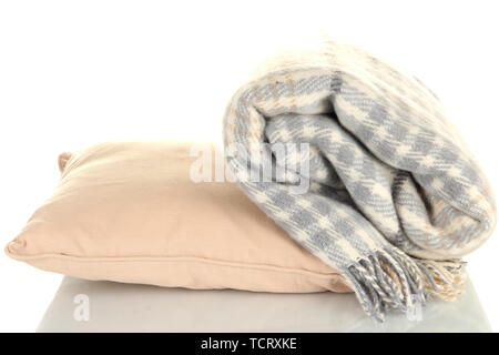 Woolen checkered plaid and pillow, isolated on white Stock Photo