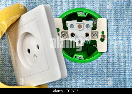 Residential electrical services, setting up of new power point. Stock Photo