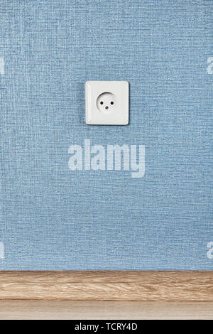 European power socket type C, electrical point of power at home, on the blue background. Stock Photo