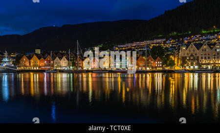 Bergen night cityscape with traditional wooden houses part of Bryggen historic district, UNESCO World Heritage Site. Bergen, Norway, August 2018 Stock Photo