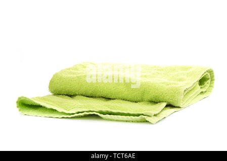 Green terry towel isolated on white background. Close up. Copy space Stock Photo