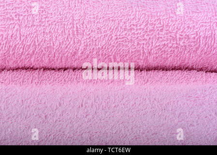 Pink terry towel. The texture of the cloth towels. Close up Stock Photo