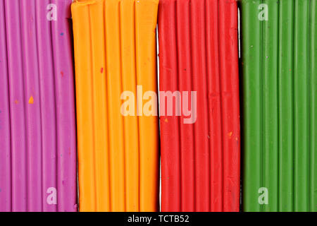 Children bright plasticine background close-up Stock Photo