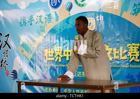 Kigali, Rwanda. 9th June, 2019. A Rwandan student shows his talent during the overseas preliminary rounds of the 12th 'Chinese Bridge' Chinese Proficiency Competition for Foreign Secondary School Students, in Kigali, capital of Rwanda, June 9, 2019. Rwanda's secondary school students from different parts of the country participated in the competition in Kigali on Sunday. Credit: Lyu Tianran/Xinhua/Alamy Live News Stock Photo