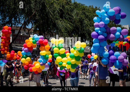 West Hollywood, California, USA. 9th June, 2019. Balloons spelling love march at the LA Pride Parade in West Hollywood, California, on Sunday, June 9. Credit: Justin L. Stewart/ZUMA Wire/Alamy Live News Stock Photo