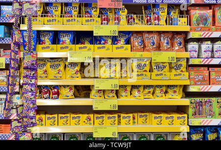 Packets of sweets in a UK supermarket Stock Photo - Alamy