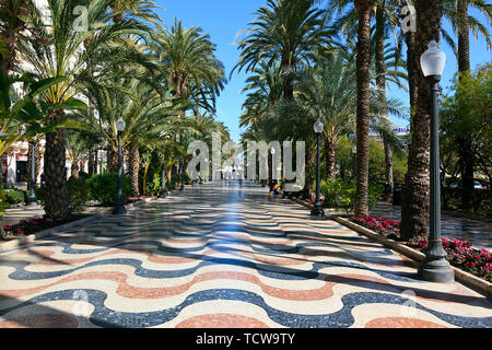 3D effect of wavy tiled paving along the Palm lined Esplanade de Espana in Alicante, Spain Stock Photo