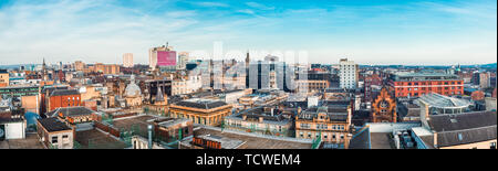 A wide stitched panoramic looking out over buildings in Glasgow city centre, Scotland, United Kingdom Stock Photo