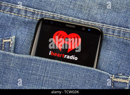 MONTREAL, CANADA - December 23, 2018: iHeartRadio android app and logo on Samsung s8 screen. iHeartRadio is a free broadcast and internet radio platfo Stock Photo