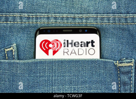 MONTREAL, CANADA - December 23, 2018: iHeartRadio android app and logo on Samsung s8 screen. iHeartRadio is a free broadcast and internet radio platfo Stock Photo