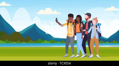 group tourists hikers with backpacks taking selfie photo on smartphone camera hiking concept mix race travelers on hike river mountains landscape Stock Vector