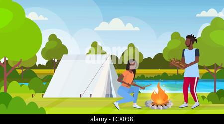 couple hikers making fire man woman holding firewood for bonfire hiking concept african american travelers on hike tent camping nature landscape Stock Vector