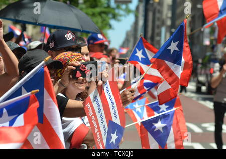 New York, USA. 09th June, 2019. New York, NY: Thousands of people participated at the annual Puerto Rican Parade along Fifth Avenue in New York City on June 9, 2019. Credit: Ryan Rahman/Pacific Press/Alamy Live News Stock Photo