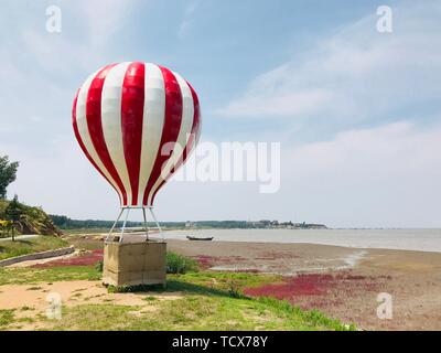 A very good-looking little scenic spot, hot air balloons, with the sea in the back, is still beautiful. Stock Photo