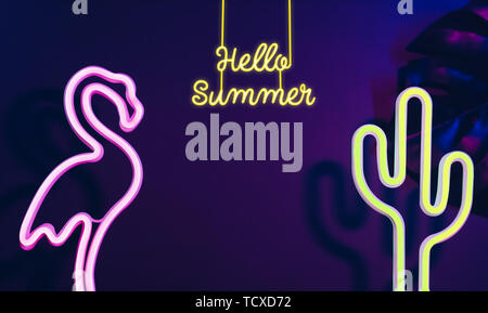 Hello Summer with pink flamingo, cactus and monstera leaf with neon pink and blue light.Vacation banner mock up space for adding text Stock Photo