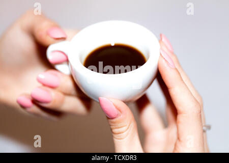Taking the neapolitan coffee in ceramic cup Stock Photo