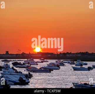 Lagoon and Airport from Pier de Faro at sunset. Faro, Algarve, Portugal Stock Photo