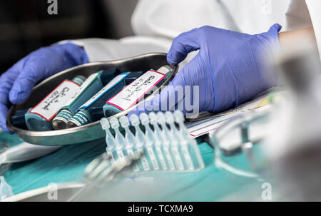 Nurse prepares salbutamol aerosols in a hospital, conceptual image Stock Photo