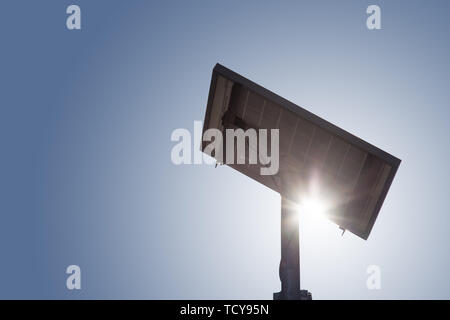 Solar panels. Back side of solar panel and sunny blue sky Stock Photo
