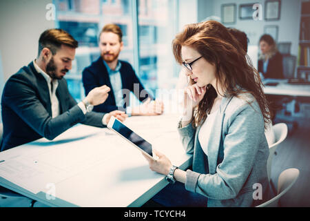 Business people working together on project and brainstorming in office Stock Photo