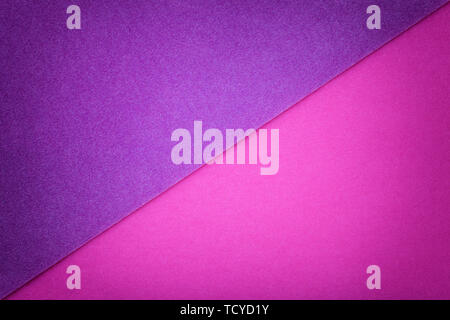 Two color background purple and violet shade. Colorful paper divided in half. Matt suede fabric closeup. Velvet texture of felt. Stock Photo