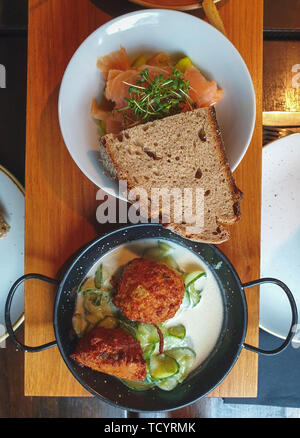 Image of top down view on bavarian tapas on wooden background Stock Photo