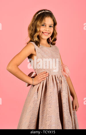 Portrait of little pin up girl in pink dress Stock Photo