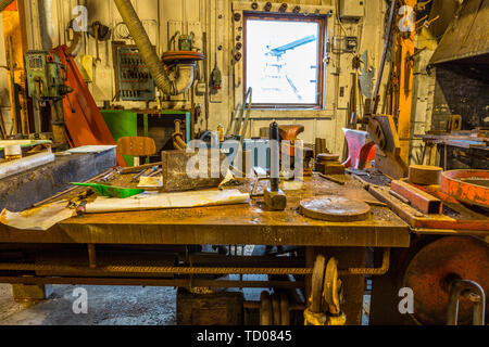 Mix of vintage and modern tools at work station in underground coal mine number 4 in Longyearbyen svalbard Stock Photo