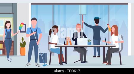 janitors team cleaners in uniform working together with professional equipment cleaning service concept creative co-working center modern office Stock Vector