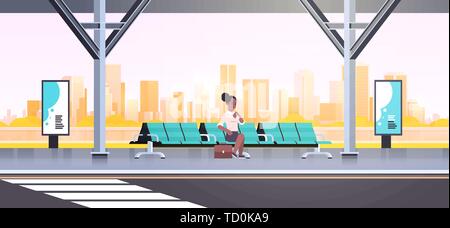 businesswoman sitting modern bus stop african american woman checking ...