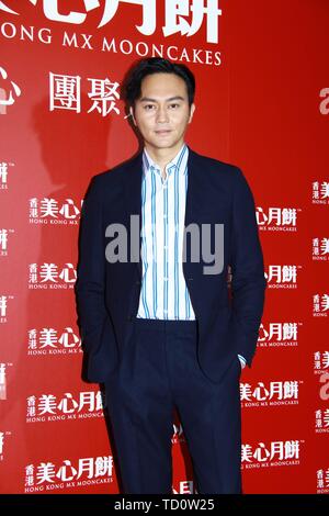 Hongkong, China. 10th June, 2019. Kelly Chen and Julian Cheung promoted for a brand mooncake in Hong Kong, China on 10 June, 2019.(Photo by TPG) Credit: TopPhoto/Alamy Live News Stock Photo