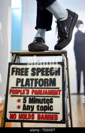 London, UK. 11 June 2019. A gallery staff member stands on 'Free Speech Platform', 2015, by Ishmahil Blagrove JR. at the preview of a major new exhibition 'Get up, Stand Up Now' at Somerset House which runs 12 June to 15 September 2019.  The exhibition celebrates over 50 years of Black creativity in Britain and beyond, showcasing works by over 100 artists.  Credit: Stephen Chung / Alamy Live News Stock Photo