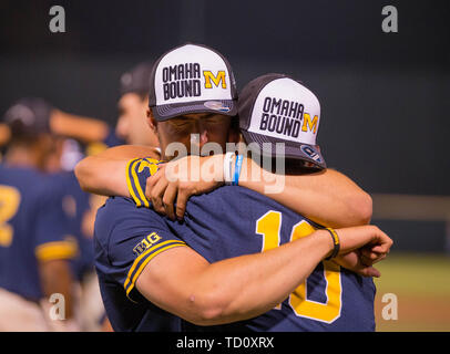 Los Angeles, CA, USA. 09th June, 2019. Two Michigan players embrace after an NCAA super regional game between the Michigan Wolverines and the UCLA Bruins at Jackie Robinson Stadium in Los Angeles, California. Michigan defeated UCLA 4-2. (Mandatory Credit: Juan Lainez/MarinMedia.org/Cal Sport Media) Credit: csm/Alamy Live News Stock Photo