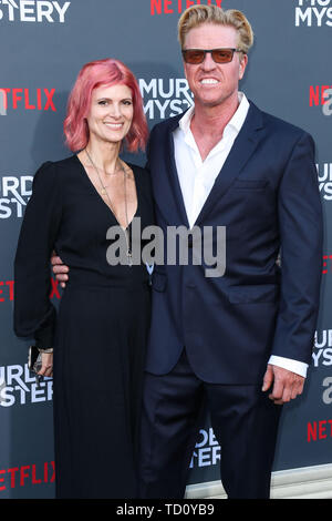 Westwood, United States. 10th June, 2019. WESTWOOD, LOS ANGELES, CALIFORNIA, USA - JUNE 10: April Hutchonson and Jake Busey arrive at the Los Angeles Premiere Of Netflix's 'Murder Mystery' held at the Regency Village Theatre on June 10, 2019 in Westwood, Los Angeles, California, United States. (Photo by Xavier Collin/Image Press Agency) Credit: Image Press Agency/Alamy Live News Stock Photo