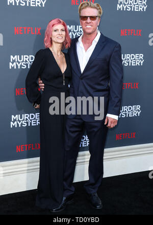Westwood, United States. 10th June, 2019. WESTWOOD, LOS ANGELES, CALIFORNIA, USA - JUNE 10: April Hutchonson and Jake Busey arrive at the Los Angeles Premiere Of Netflix's 'Murder Mystery' held at the Regency Village Theatre on June 10, 2019 in Westwood, Los Angeles, California, United States. (Photo by Xavier Collin/Image Press Agency) Credit: Image Press Agency/Alamy Live News Stock Photo