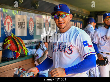 Texas Rangers' Rougned Odor gives a post game interview dripping wet after  being doused by teammates following their 10-0 win against the Los Angeles  Angels in a baseball game, Friday, July 7