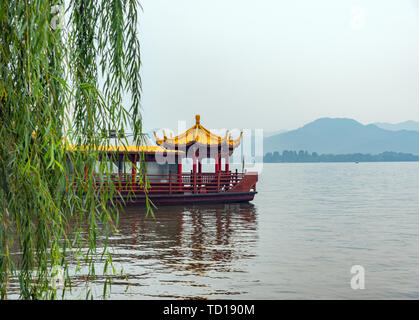 Painting boat on the West Lake. Stock Photo