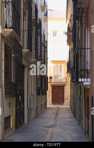 An image of an ancient and narrow street of the city of Valencia in Spain Stock Photo