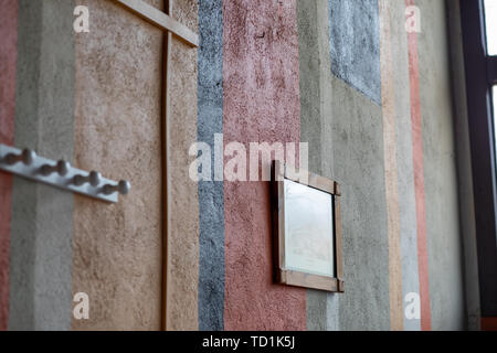 Coat rack and wall box with different colors and texture with relief Stock Photo