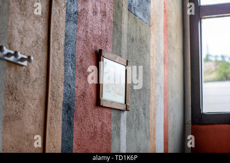 Coat rack and wall box with different colors and texture with relief Stock Photo