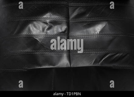 Black torn leather texture with stripes, surface background Stock Photo