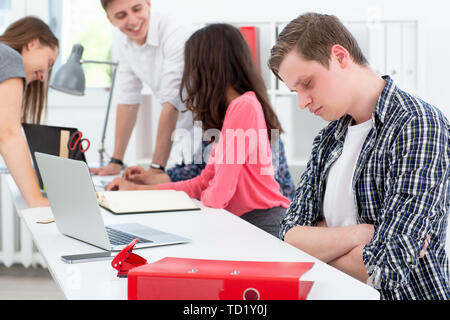 A man programmer fell asleep at meeting Stock Photo